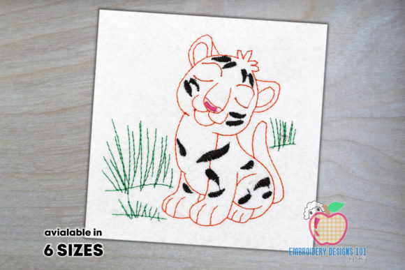 Cute Tiger Cub Sitting on Grass